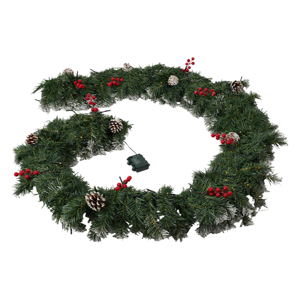 Garden Sanctuary Christmas wreath with LED light string, decorated with festive greenery and ornaments for holiday decor.