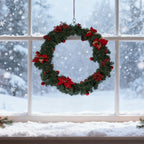 Artificial Christmas garland by Garden Sanctuary, 2.7 meters long, decorated with festive greenery and holiday accents for seasonal decor.