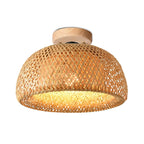 Handmade bamboo pendant light shade by DEMOLIGHTS hanging from a ceiling, showcasing natural woven bamboo design.
