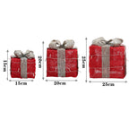 Set of 3 glitter Christmas gift boxes with light-up feature from Garden Sanctuary, perfect for holiday holiday decoration.