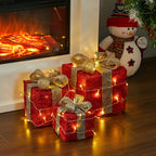 Set of 3 Garden Sanctuary light-up square Christmas gift boxes with glitter accents, perfect for festive holiday decoration.