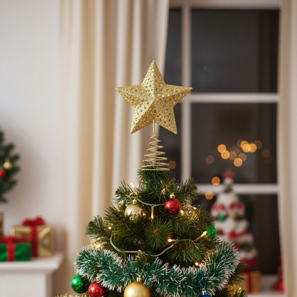 Golden glitter Christmas tree star topper with intricate design, ideal for holiday home decor from Garden Sanctuary.