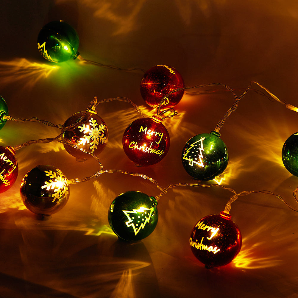 Multicoloured Christmas ball ornament string lights from Garden Sanctuary, battery-powered holiday decor with festive glowing ornaments.