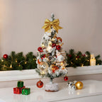 Small Garden Sanctuary tabletop Christmas tree with LED lights, decorated for the holiday season, perfect for festive home decor.