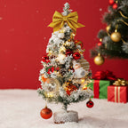 Garden Sanctuary tabletop Christmas tree with LED lights, small festive holiday decor for Christmas celebrations.
