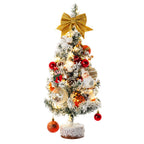 Garden Sanctuary tabletop Christmas tree with LED lights, festive holiday decor featuring green pine branches and illuminated accents.