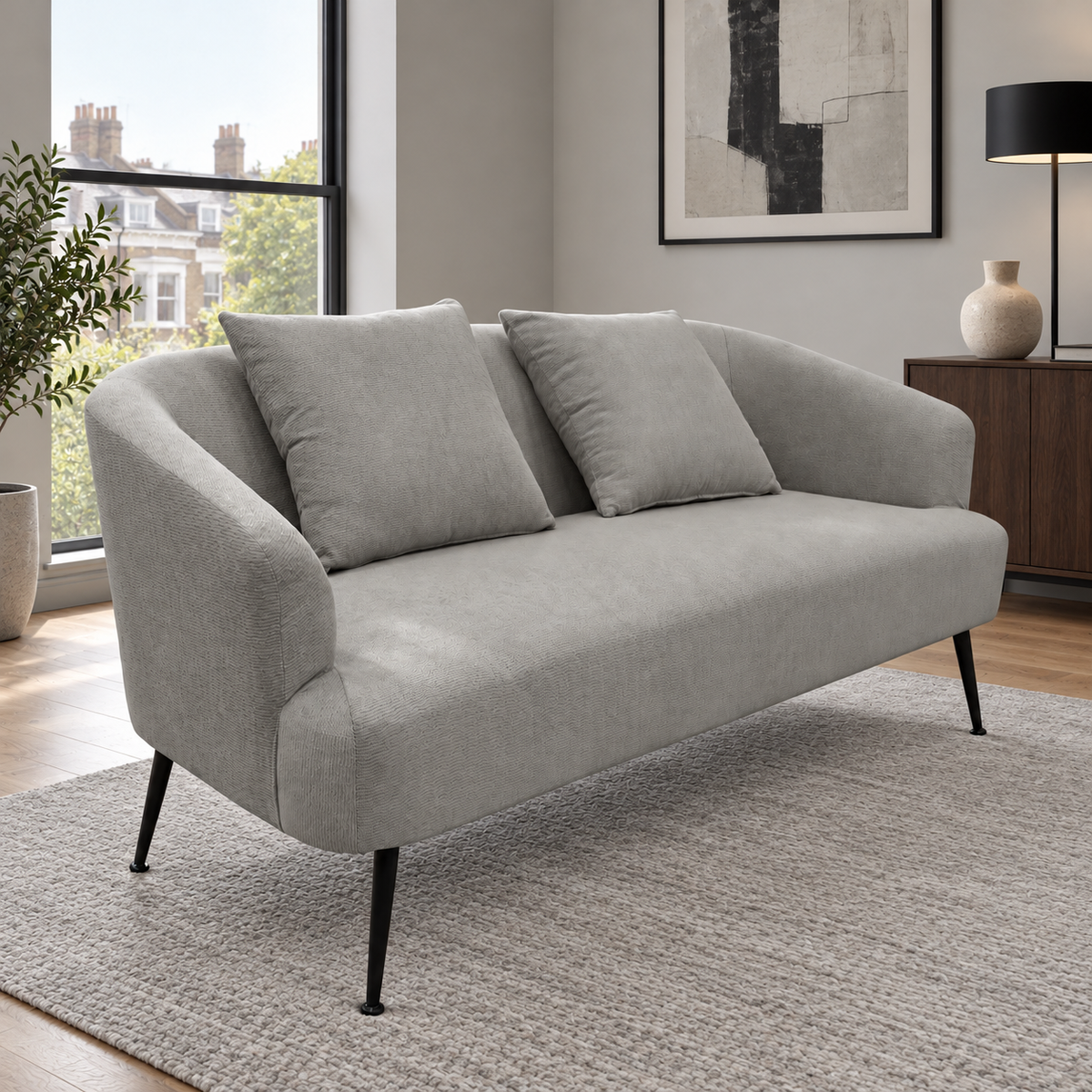 Modern Garden Sanctuary chenille 2-seater sofa with two scatter cushions, featuring plush upholstery and sleek design.