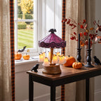 Garden Sanctuary Halloween table lamp featuring spooky pumpkin design with orange and black colors, perfect for festive home decor.