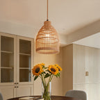 E27 bamboo-woven ceiling pendant light from Garden Sanctuary hanging from ceiling with warm ambient lighting.