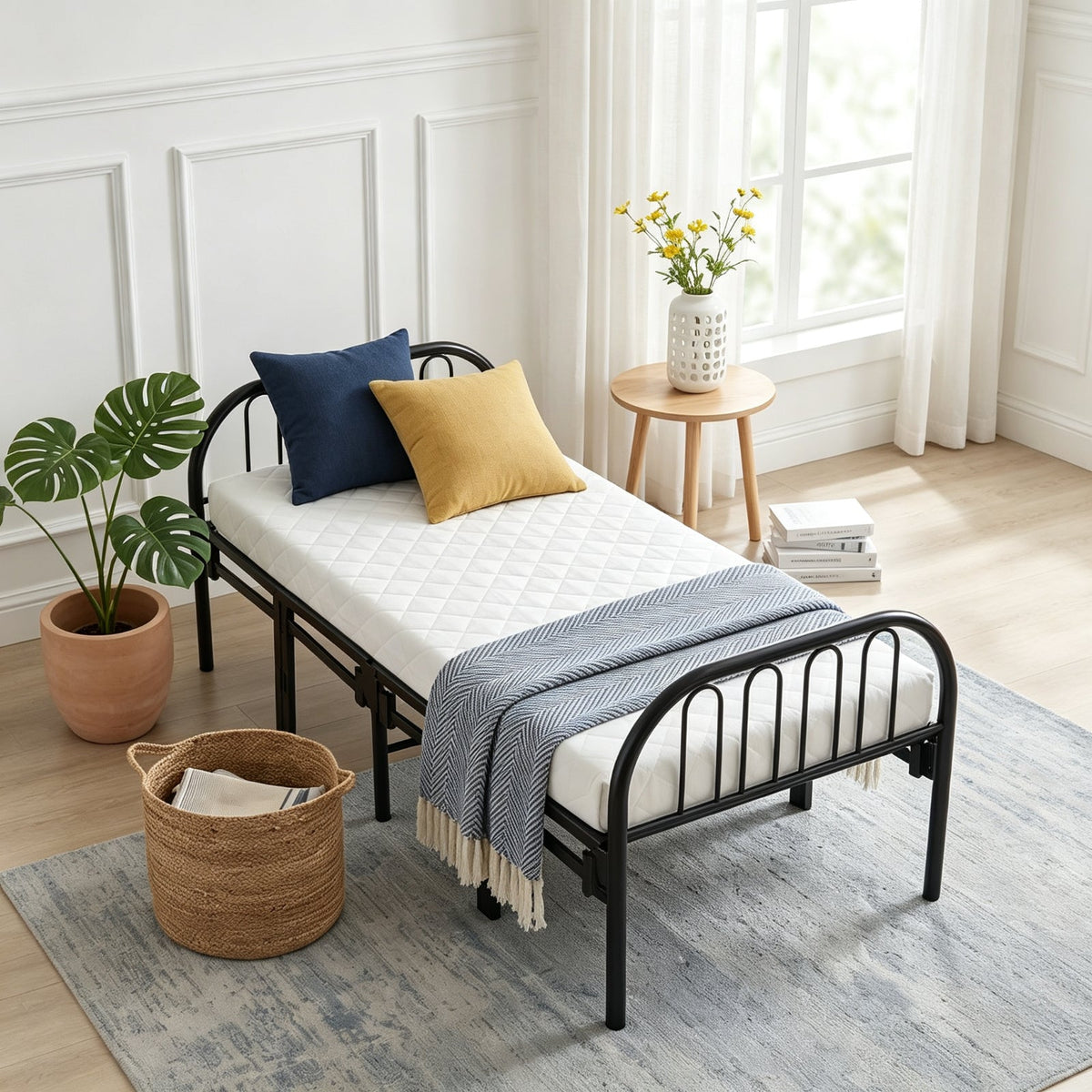 Garden Sanctuary metal folding bed frame with secure buckle design, showing the sturdy frame and compact folded position.