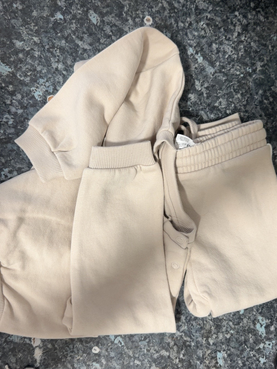 Beige two-piece toddler top and joggers set for age 2 years